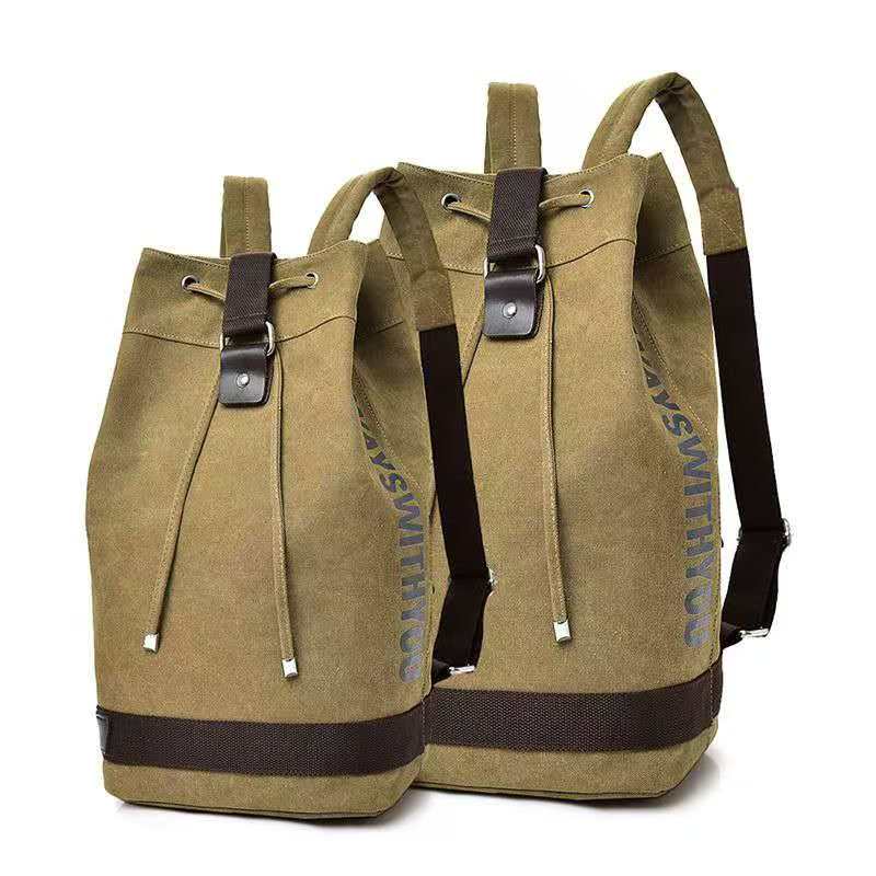 Canvas Backpack Casual - กระเป๋าเป้ผ้าแคนวาสปี 2026 พร้อมสายสะพายไหล่คู่ กระเป๋าทรงถังความจุขนาดใหญ่ เหมาะสำหรับทั้งชายและหญิง ใช้สำหรับการเดินทางแบบสบายๆ
